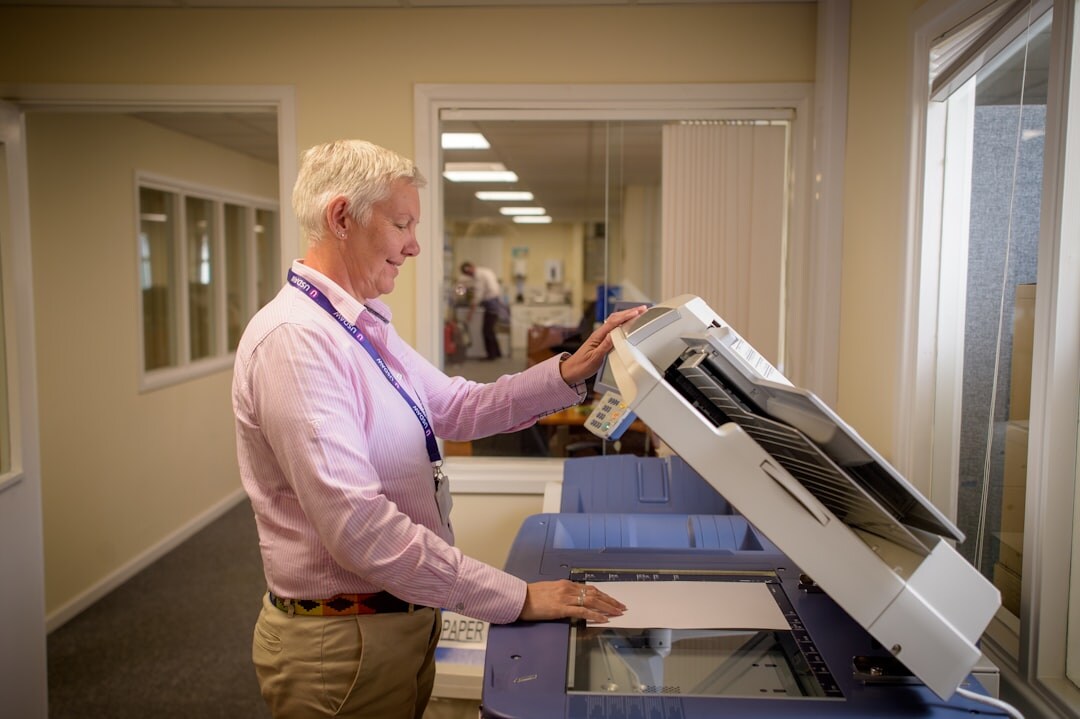 Press officer reviewing printed materials